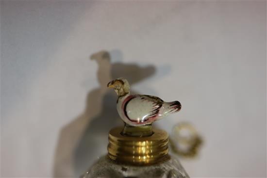 A late 18th century gold mounted glass scent bottle, the dove stopper possibly St James porcelain, H. 5.2cm, with original leather ca